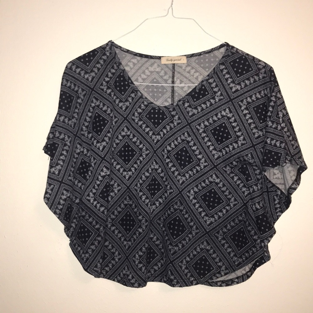 Patterned blues that wears like a shawl